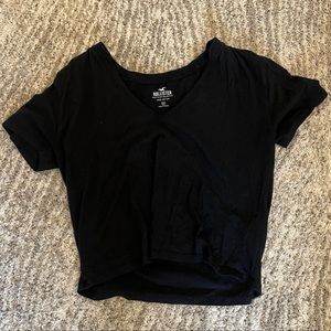 Black Hollister V neck cropped shirt, size Medium.